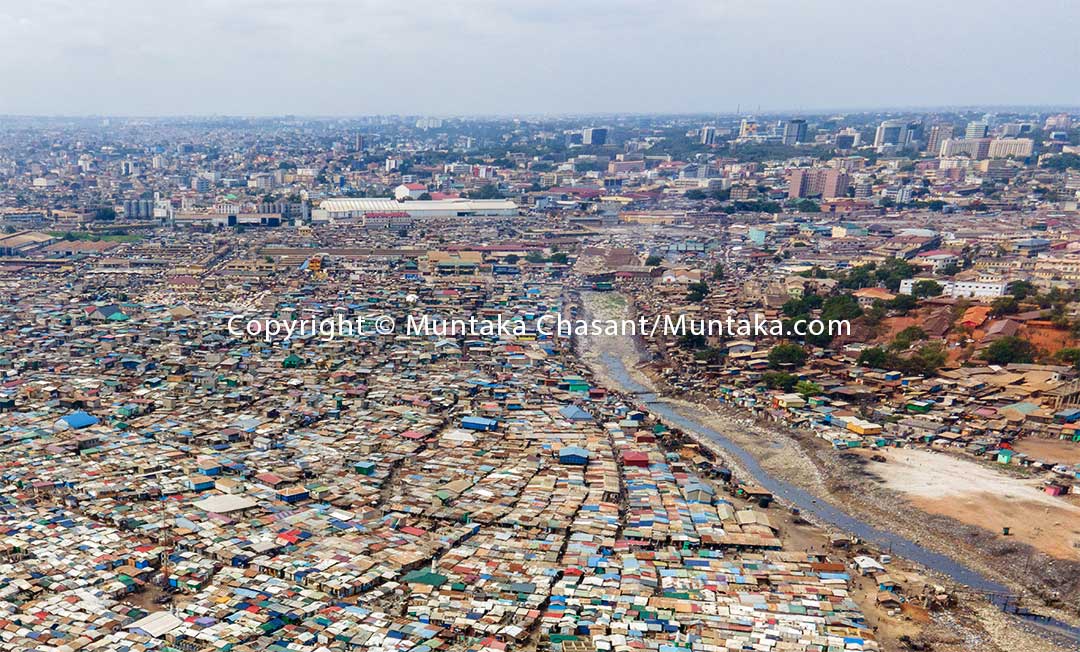 Old Fadama against Accra (central) skyline. Copyright © Muntaka Chasant