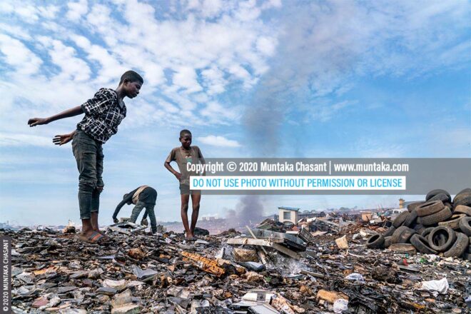 Hazardous child labour and e-waste: 15-year-old Emmanuel Osei had just smashed an old CRT TV against a rock to recover the iron materials inside at Agbogbloshie, Ghana. © 2020 Muntaka Chasant