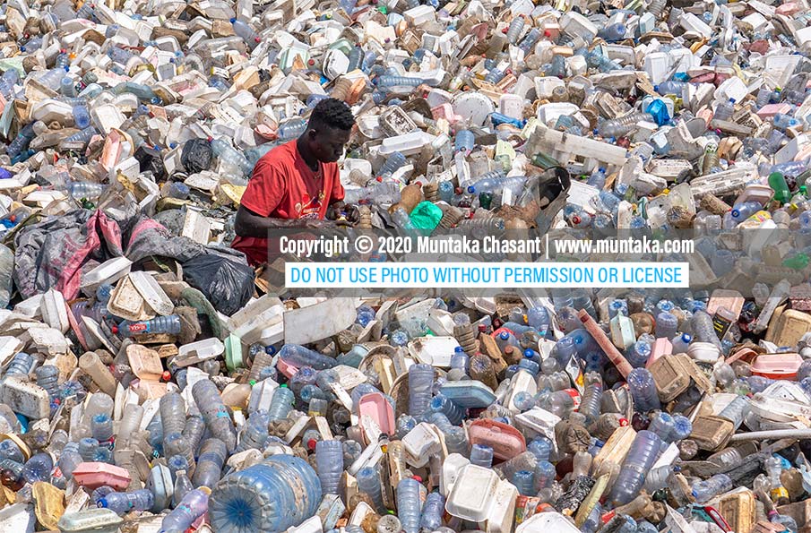 Plastic waste in Ghana: Plastic pollution is destroying Ghana's water bodies. A young man is busy recovering recyclable plastic waste in the Korle Lagoon in Accra. Only 5% of the plastic waste generated in Ghana every year are recycled. Copyright © 2020 Muntaka Chasant