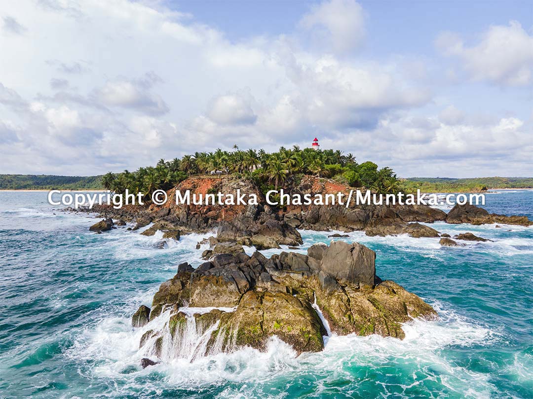 Cape Three Points, Ghana: This islet is the nearest known land to the imaginary Null Island at zero degrees latitude and longitude in the Atlantic Ocean. Copyright © 2020 Muntaka Chasant