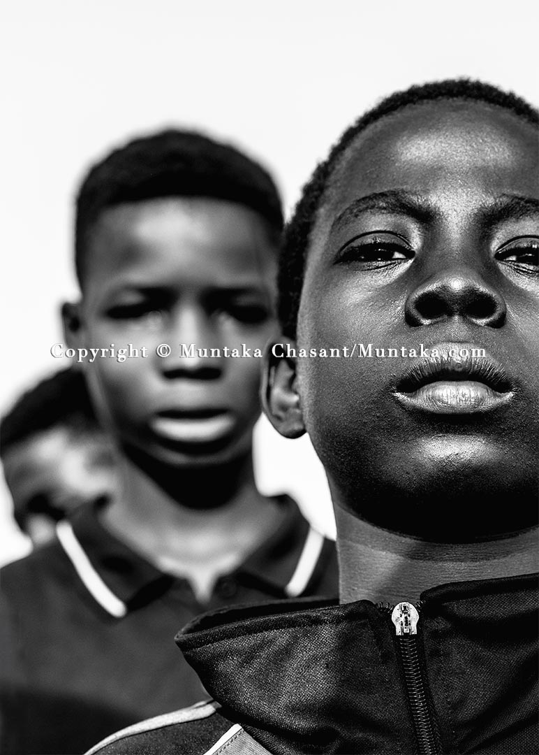 Poor children: Kwaku Frimpong (right), 12 years old, is an urban poor engaged in hazardous child labour on the fringes of Accra, Ghana's capital city. Copyright © 2020 Muntaka Chasant