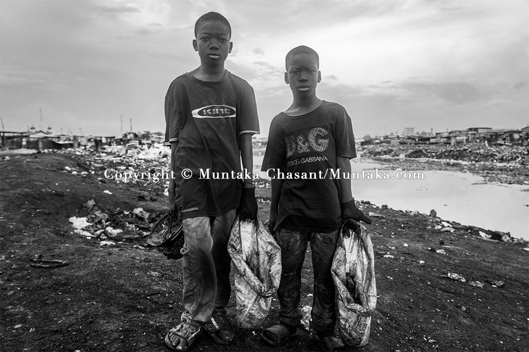 Hazardous child Labour along the banks of the Korle Lagoon, Accra, Ghana. Copyright © Muntaka Chasant