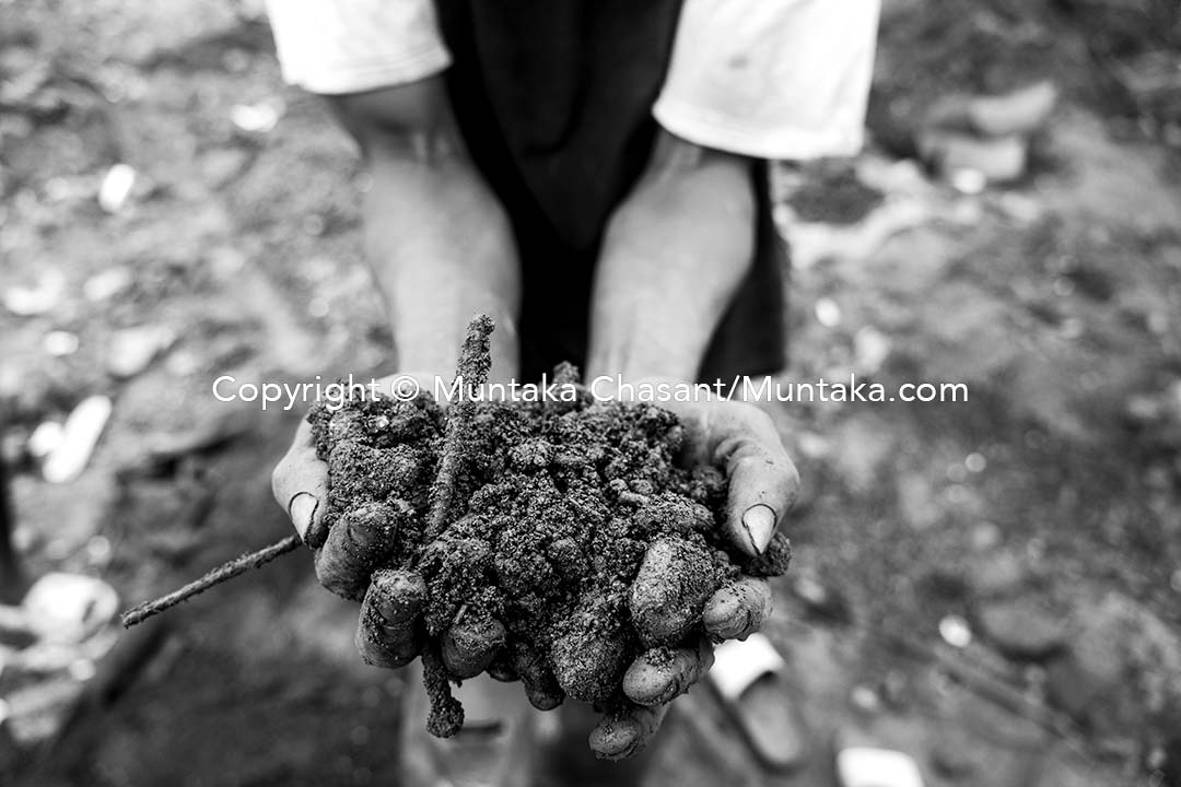 Recovered scrap metal buried under the surface of the demolished Agbogbloshie site. Copyright © Muntaka Chasant